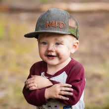 Load image into Gallery viewer, Boy covered in dirt wearing youth Wild camo hat
