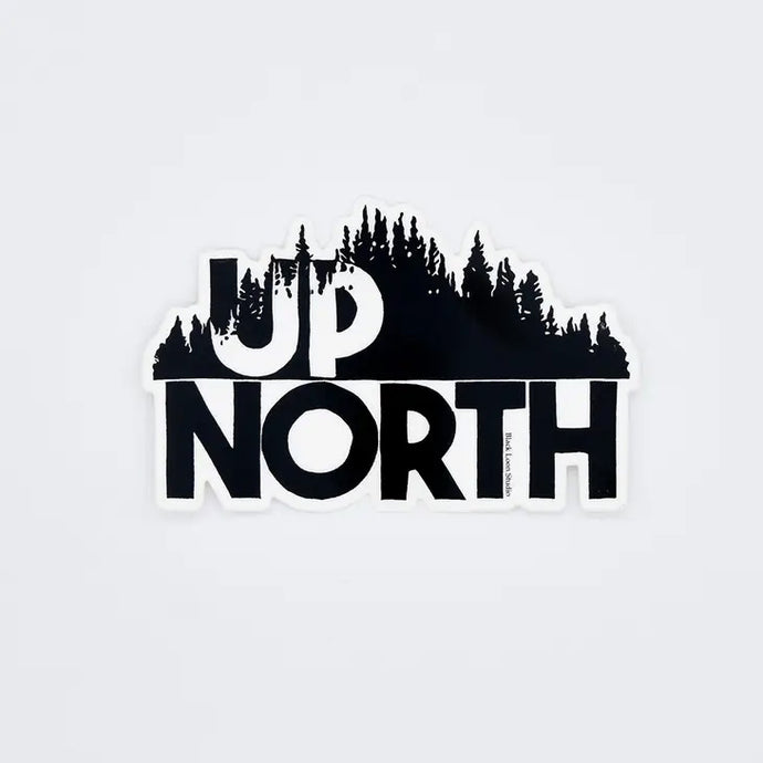 Up North Sticker shows trees on a hillside