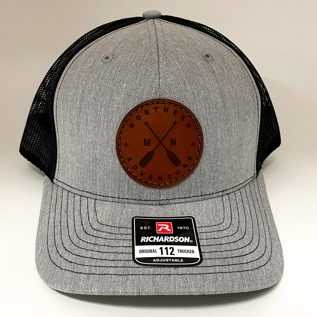 Grey and black hat with leather cross paddle MN patch