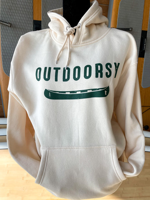 Tan hooded sweatshirt that says outdoorsy in green with a green canoe with minnesota logo on it
