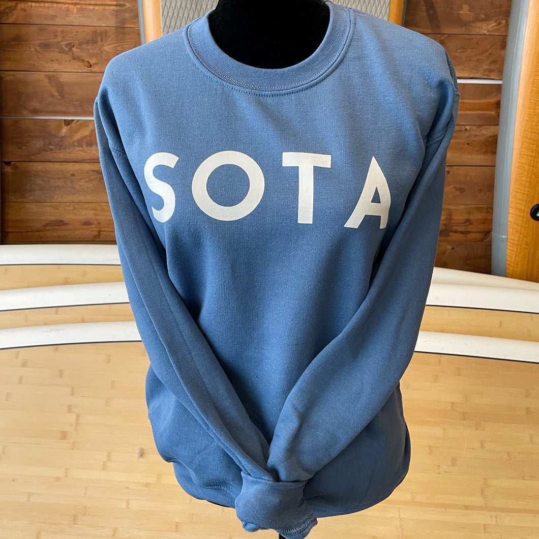 Indigo blue crewneck that says SOTA