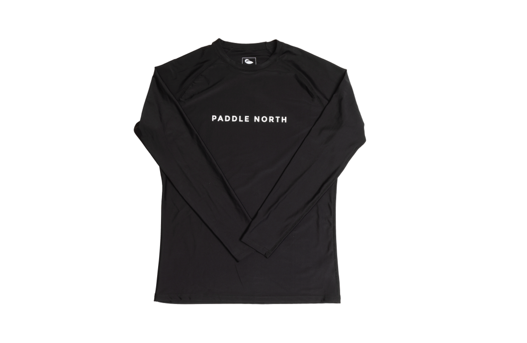 Black paddle shirt that says Paddle North in white letters